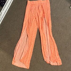 Orange and white designed flowy open slit pants
